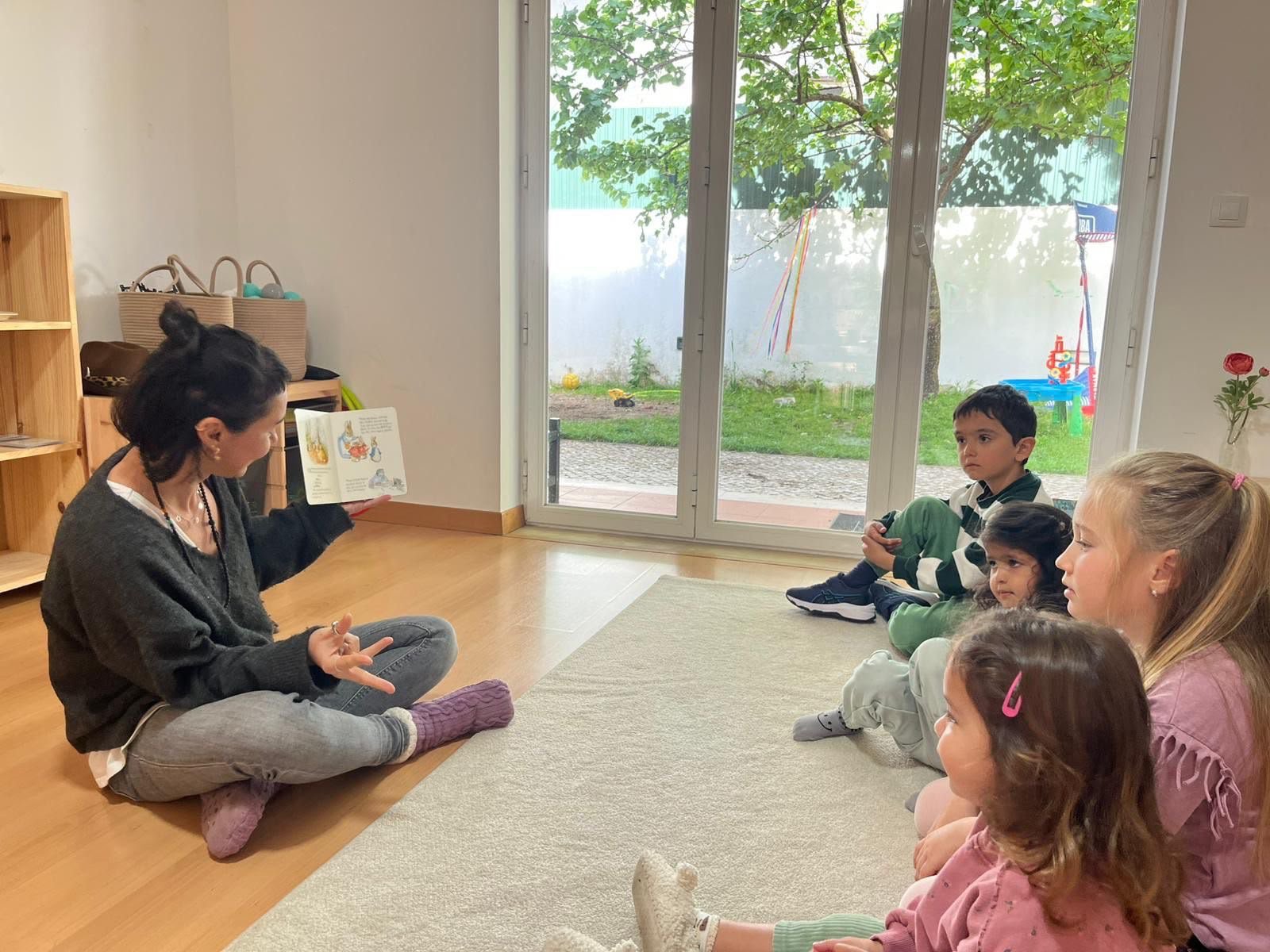 Montessori Practical Life activity with a pitcher and ceramic bowl